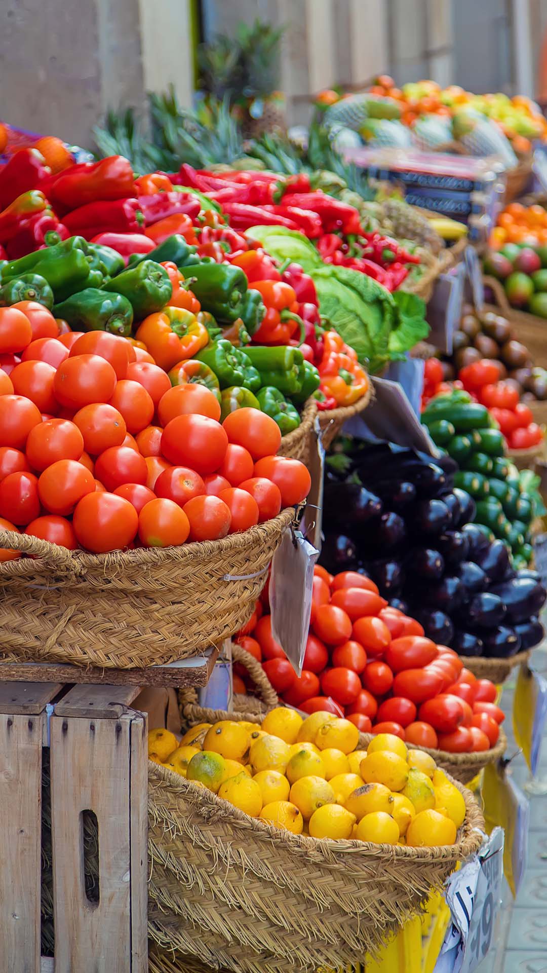 Market stalls with vegetables and fruits. Selective focus.